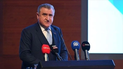 Bakan Bak'tan Dursun &Ouml;zbek'e tebrik